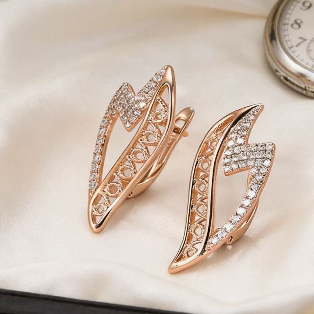 Delicate and petite openwork cross earrings